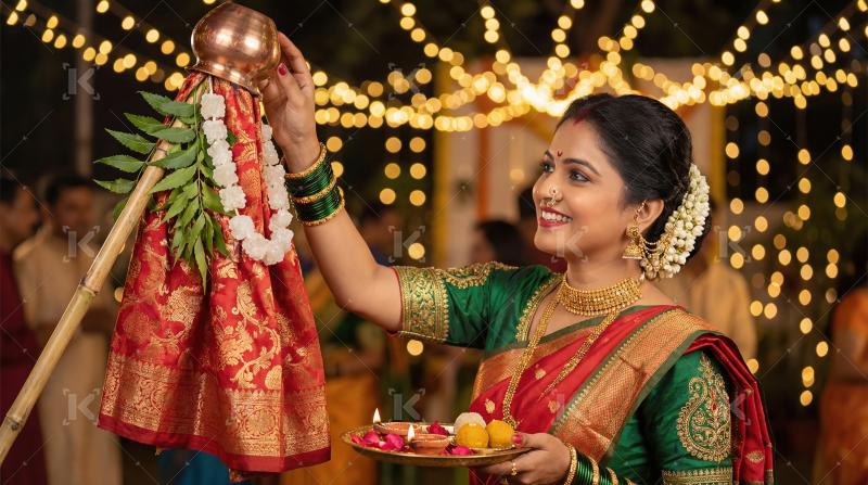 Woman celebrating Gudi Padwa festival with traditional offerings
