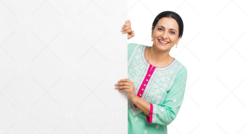 Smiling Indian woman presents a blank white signboard for your message.