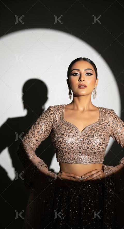 Young indian woman wearing fashionable cloths posing on isolated