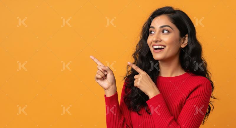Cheerful young woman pointing with both hands to empty copy spac