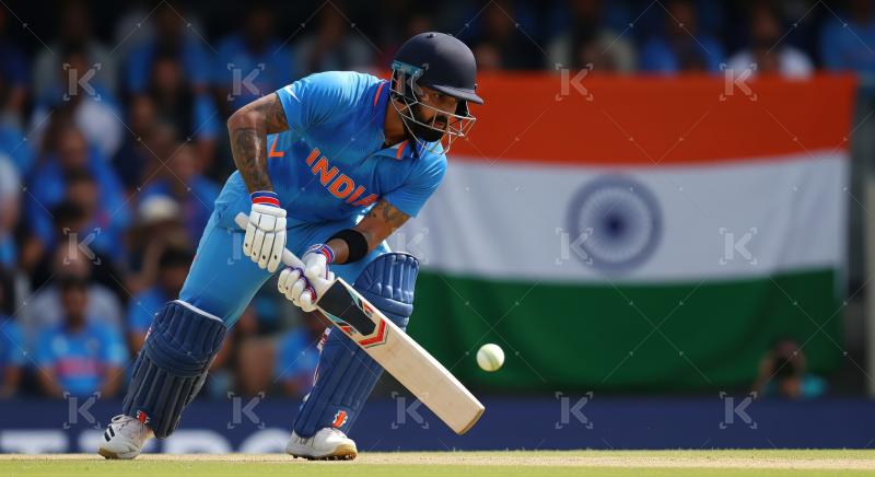 Indian Cricketer Batting in Action During International Match