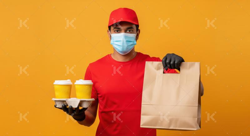 Masked courier provides safe, prompt food and drink delivery service.