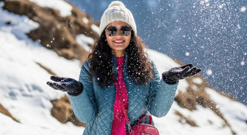 Happy Woman Enjoying Winter Snow in Mountain Landscape