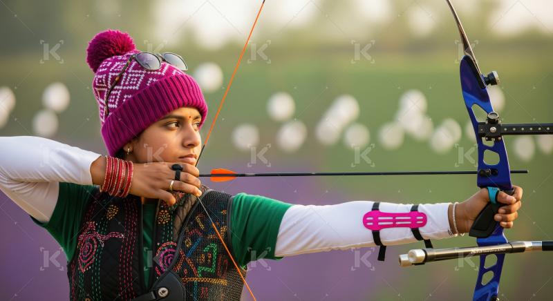 Young Indian Archer Focuses on Target at Outdoor Range