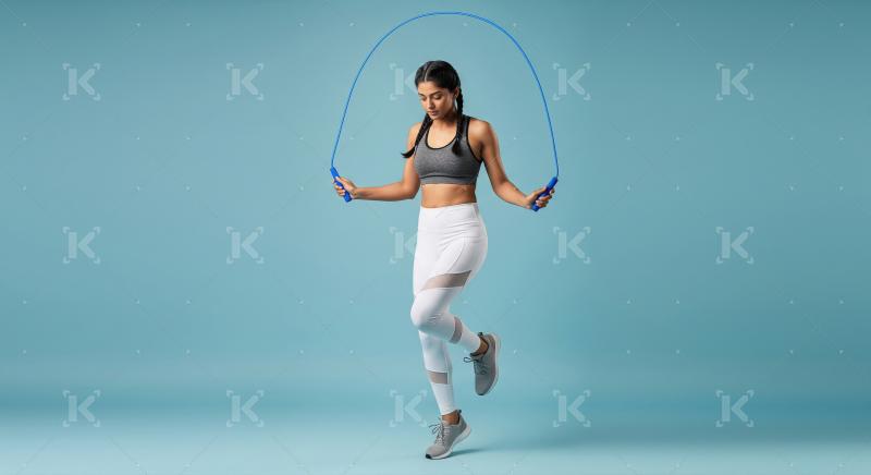 Young Indian Woman Skipping Rope for Fitness and Exercise