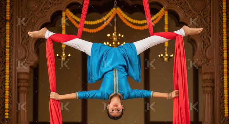 Young Indian girl's stunning aerial split combines art and tradi