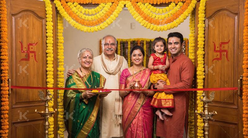 Happy Indian Family at Traditional Housewarming Ceremony