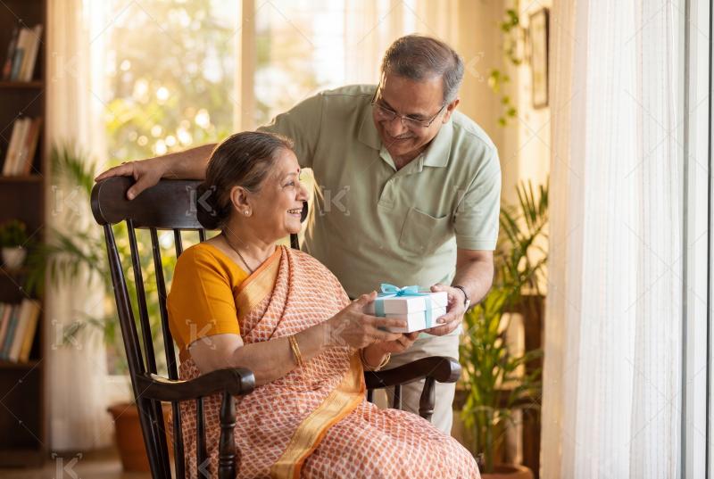 Happy elderly indian couple enjoying together