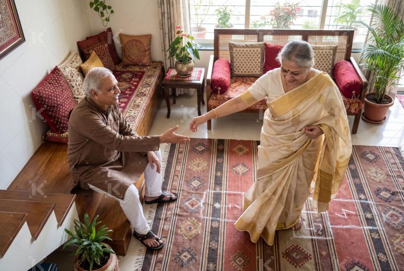 Happy elderly indian couple enjoying together