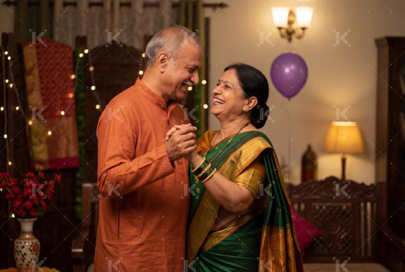 Happy elderly indian couple enjoying together