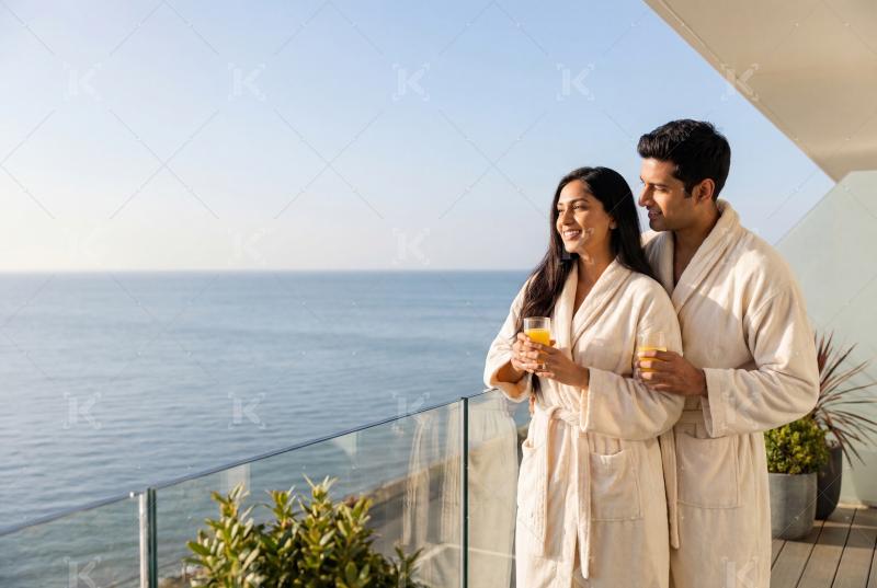 Young indian couple enjoying together at balcony