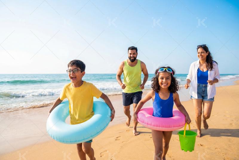 Happy indian family enjoying on sea beach