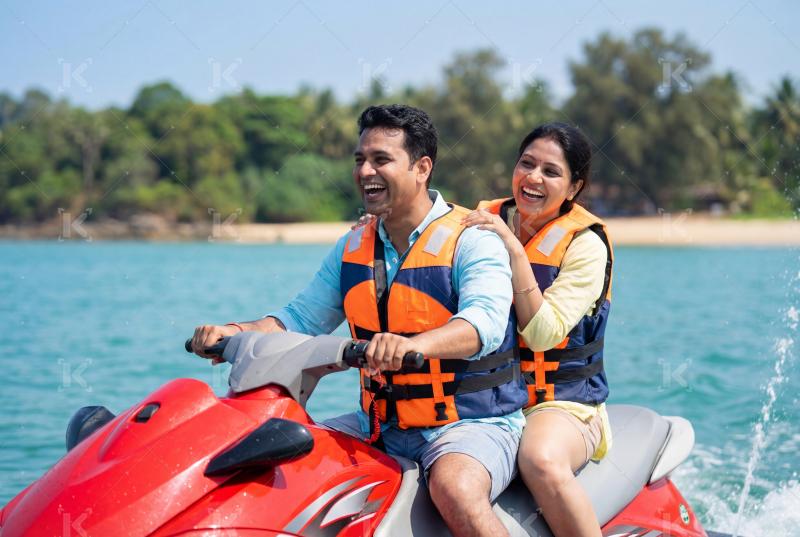 Happy indian family enjoying on sea beach