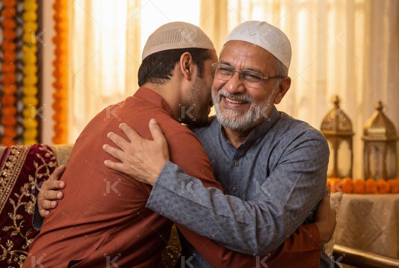 Two indian men Hug to each other on ramadan Eid festival