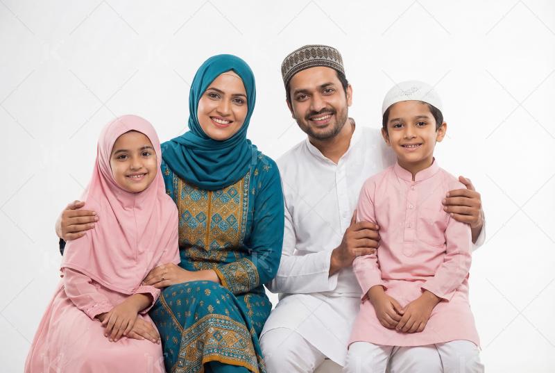 Happy indian family celebrating Eid festival