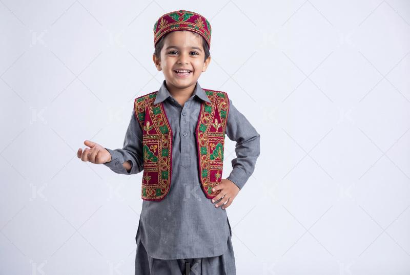 Cute indian little boy in traditional wear on Eid festival