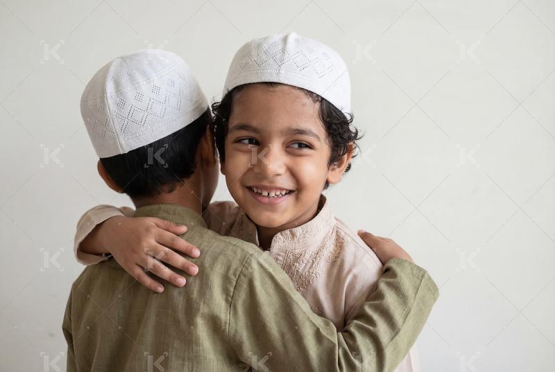 Indian children hug to each other on Eid festival