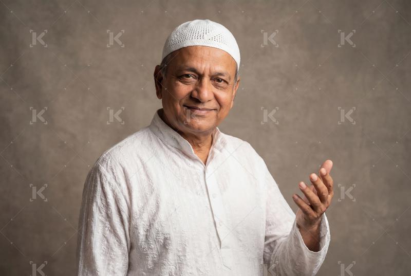Indian muslim man in traditional wear on Eid festival