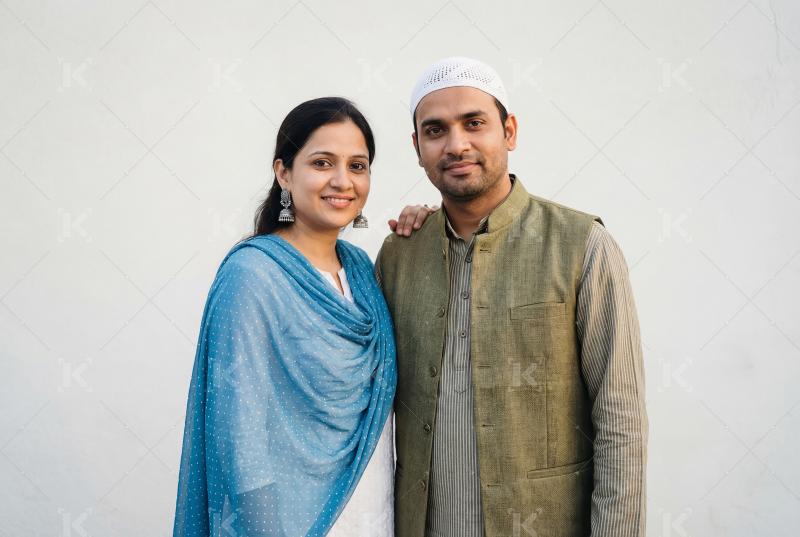 Happy indian muslim couple standing together on Eid Festival