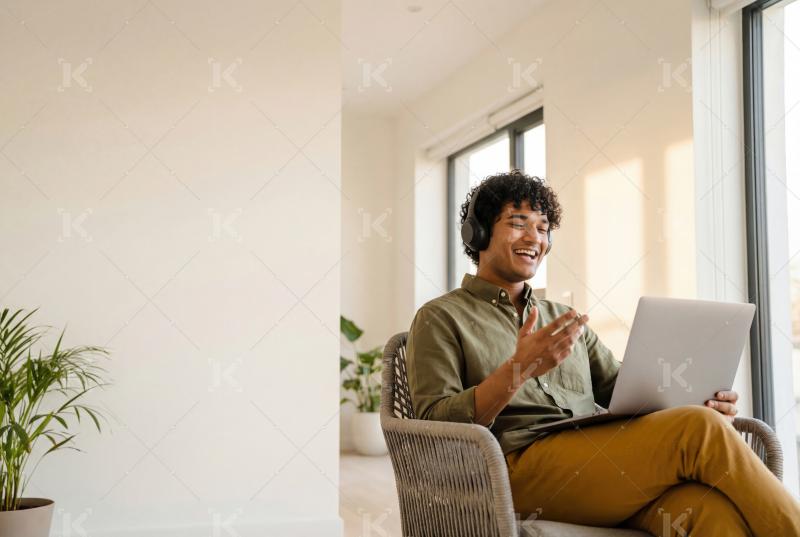 A young professional enjoys a relaxed and productive remote work