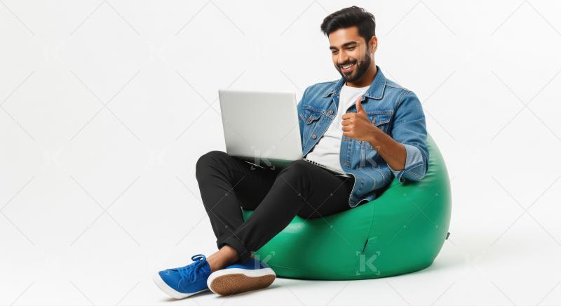 Happy Man Works on Laptop, Giving Thumbs Up