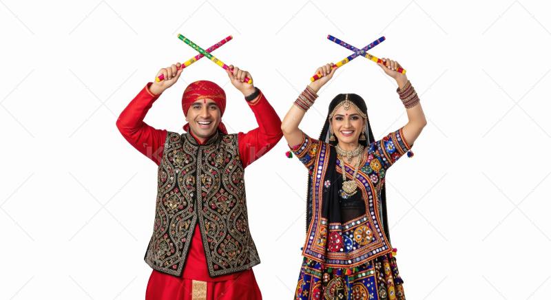 Indian Couple Joyfully Celebrating Festival with Dandiya Dance S