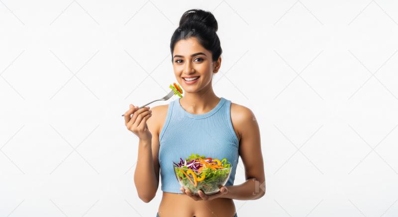 Happy Indian Woman Enjoying Fresh Healthy Salad