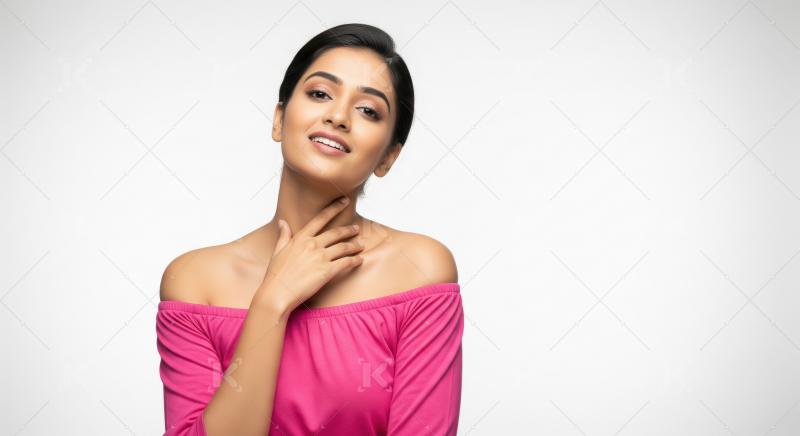 Beautiful Indian Woman Smiling Confidently in Pink Off-Shoulder