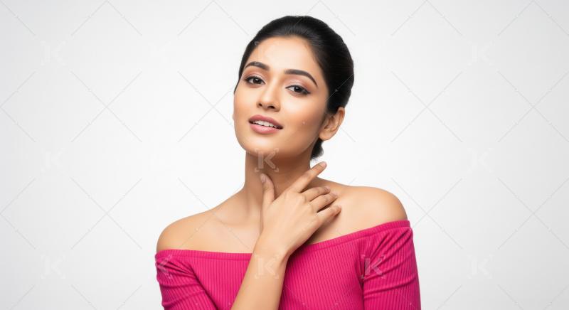 Beautiful Indian Woman Posing Gracefully in Pink Off-Shoulder To