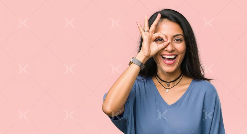 Young beautiful indian woman smiling and giving happy expression