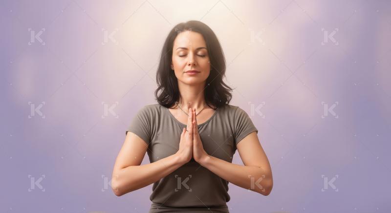 Serene Woman Meditating with Closed Eyes and Prayer Hands