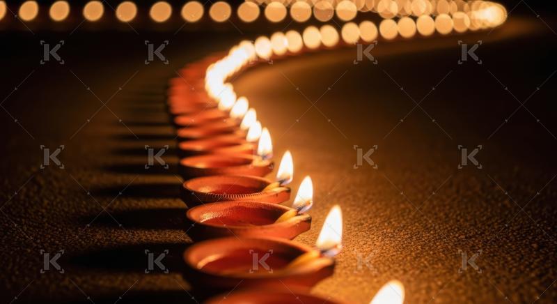 Close up of oil lamp on rangoli on diwali festival