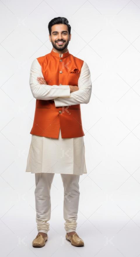 Young indian man wearing traditional kurta standing on white bac