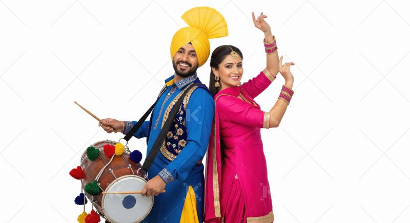 Joyful Punjabi Couple Playing Dhol and Dancing Together